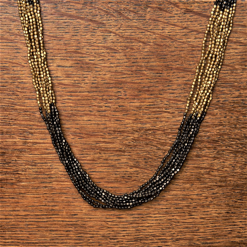 Artisan handmade black and pure brass, cube beaded striped multi strand necklace designed by OMishka.