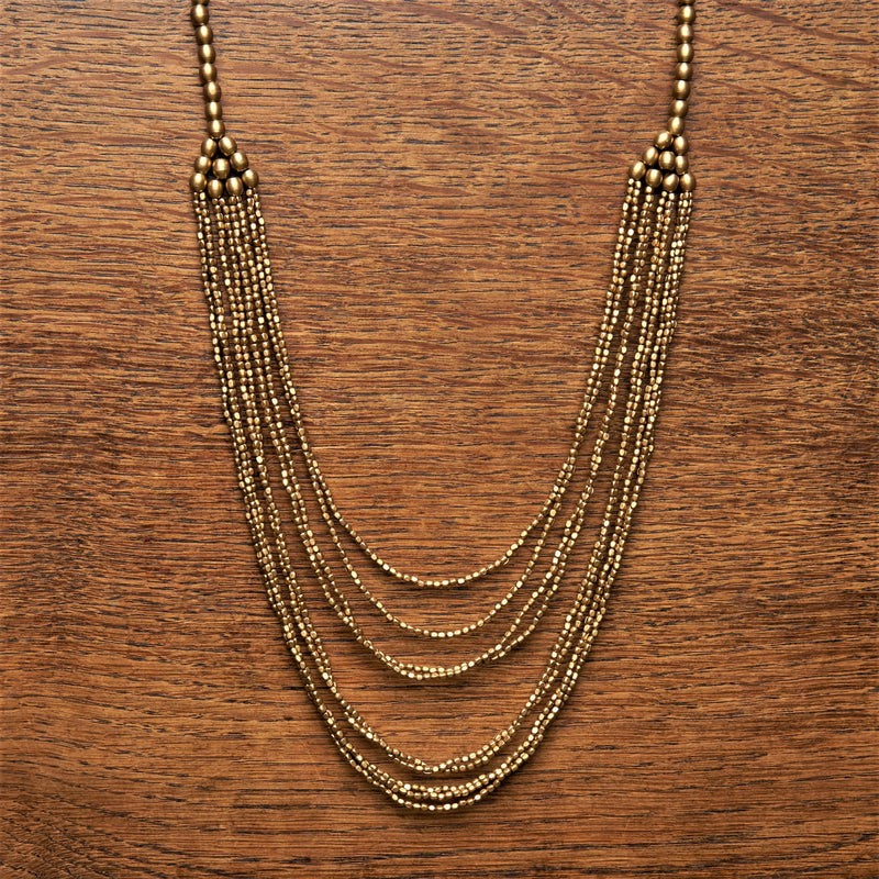 Artisan handmade, pure brass tiny cube and round beaded, layered multi strand necklace designed by OMishka.