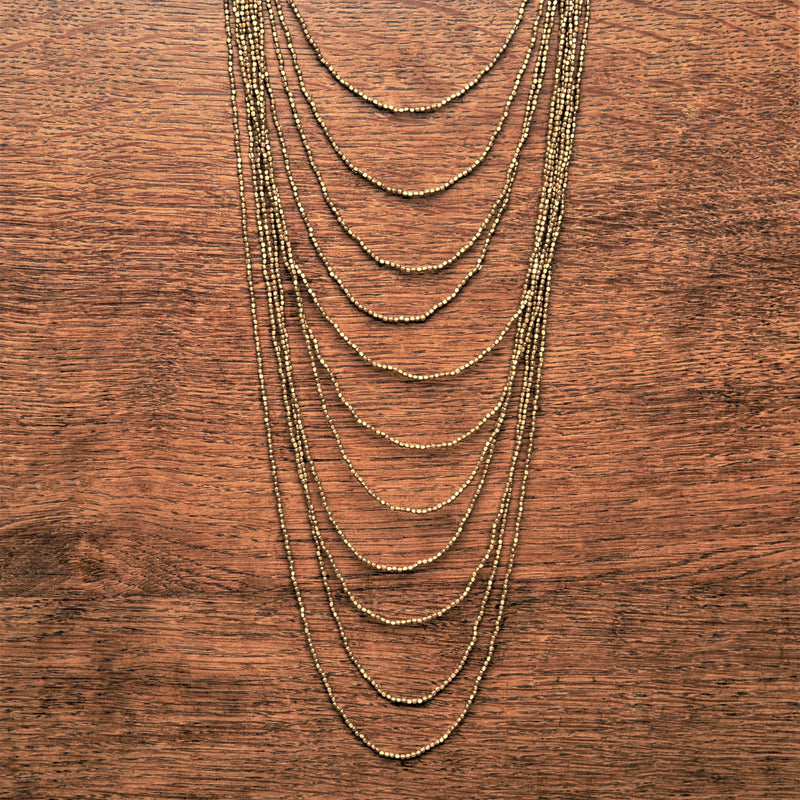 Artisan handmade pure brass, tiny cube beaded, long, layered multi row necklace designed by OMishka.