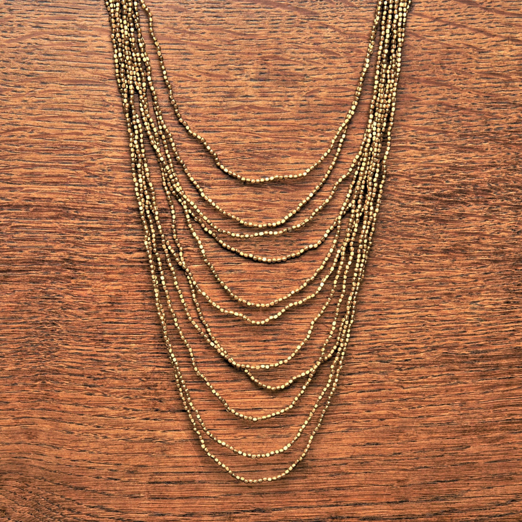 Artisan handmade pure brass, tiny cube beaded, long, layered multi strand necklace designed by OMishka.