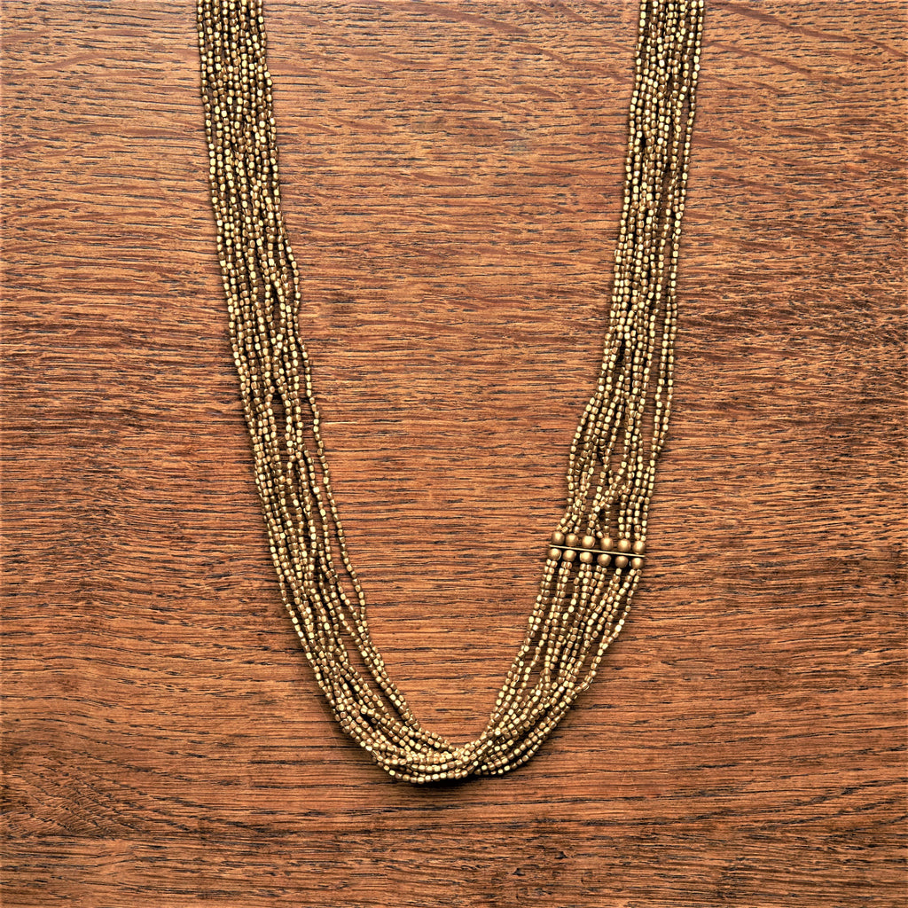 Artisan handmade, long, pure brass tiny cube and smooth barrel beaded, multi strand necklace designed by OMishka.