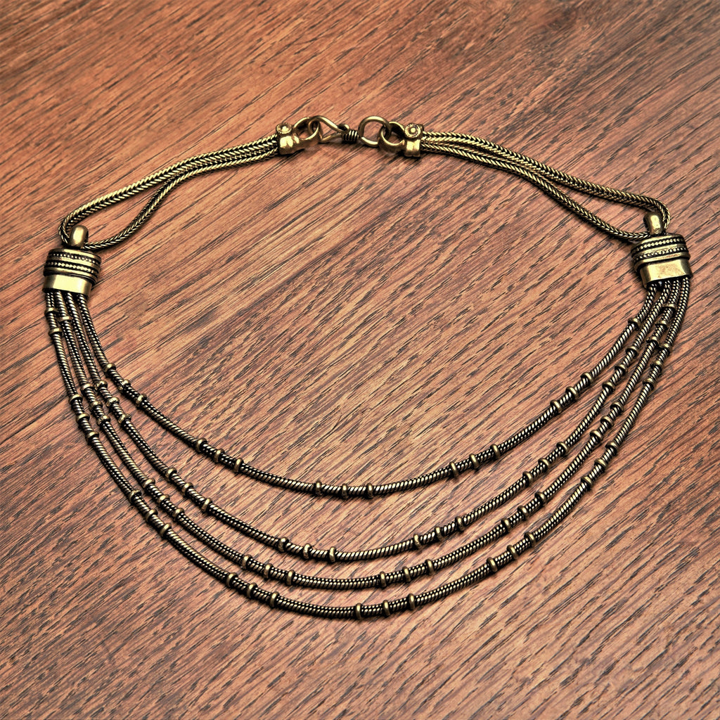 Artisan handmade pure brass, multi strand, subtle disc beaded, layered snake chain necklace designed by OMishka.