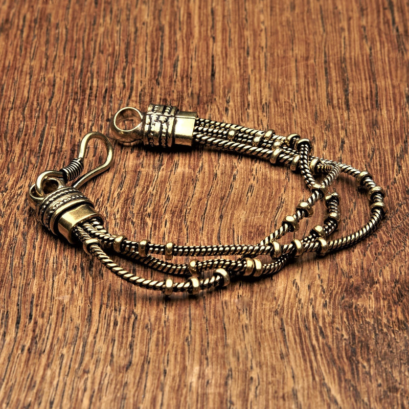 Artisan handmade pure brass, triple strand, subtle beaded snake chain designed by OMishka.