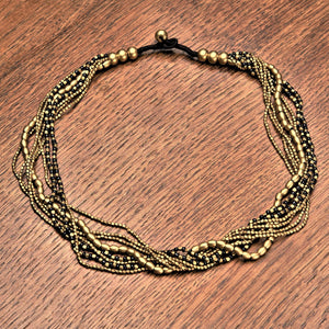 Artisan handmade pure brass and black glass beaded, multi strand necklace designed by OMishka.