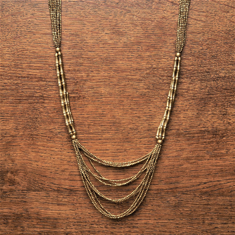 Artisan handmade pure brass, tiny cube and bone beaded, layered multi strand necklace designed by OMishka.