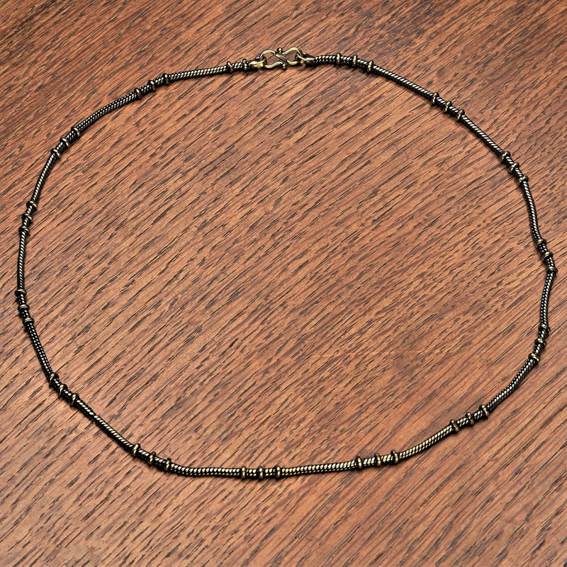 Artisan handmade pure brass, disc beaded snake chain necklace designed by OMishka.