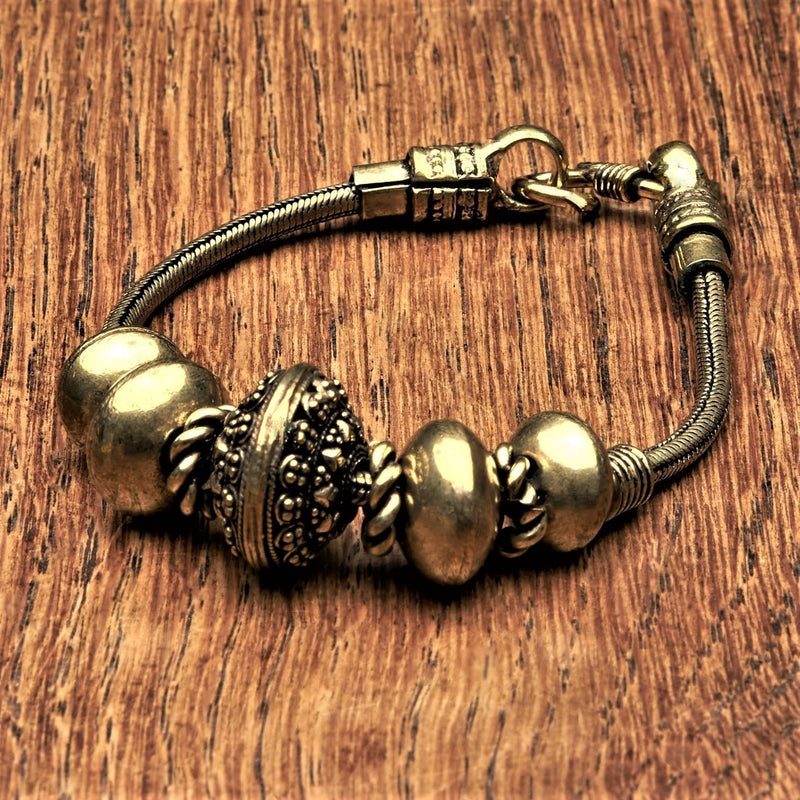 Artisan handmade pure brass, decorative dotted bead, snake chain bracelet designed by OMishka.