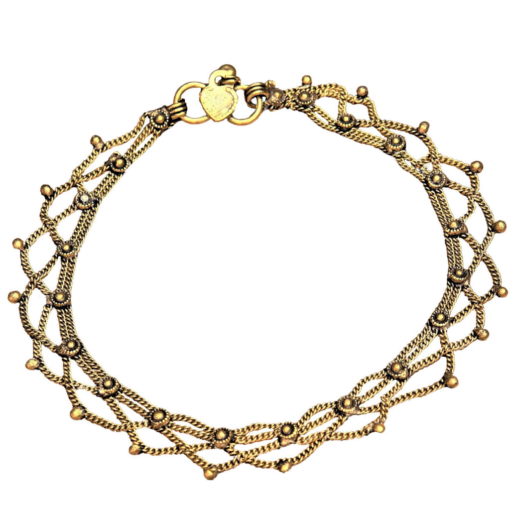 An artisan handmade, pure brass fancy beaded, drop chain ankle bracelet designed by OMishka.