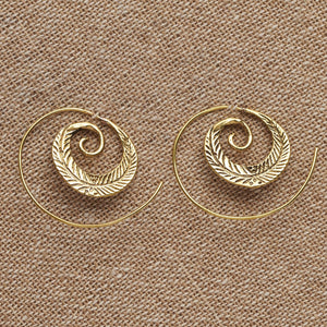 Artisan handmade pure brass, feather spiral hoop earrings designed by OMishka.