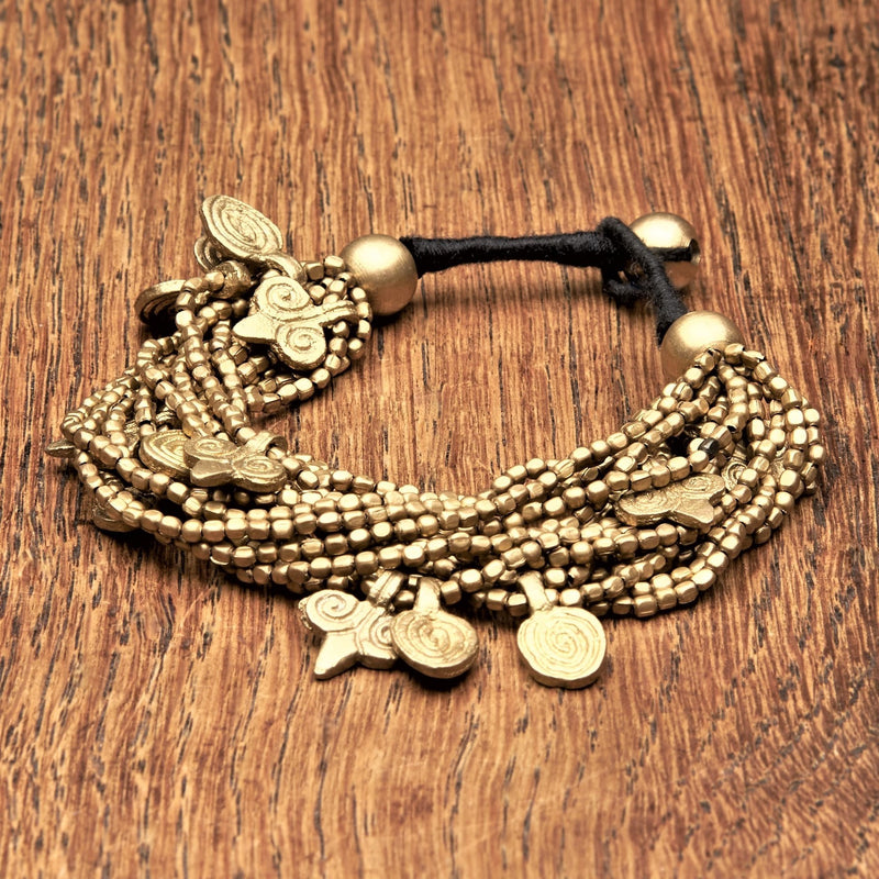 Artisan handmade pure brass, chunky multi strand beaded, spiral charm bracelet designed by OMishka.