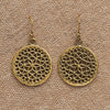 Artisan handmade pure brass, seed of life mandala, disc drop earrings designed by OMishka.