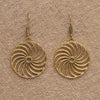 Artisan handmade pure brass, geometric sun swirl, disc drop hook earrings designed by OMishka.