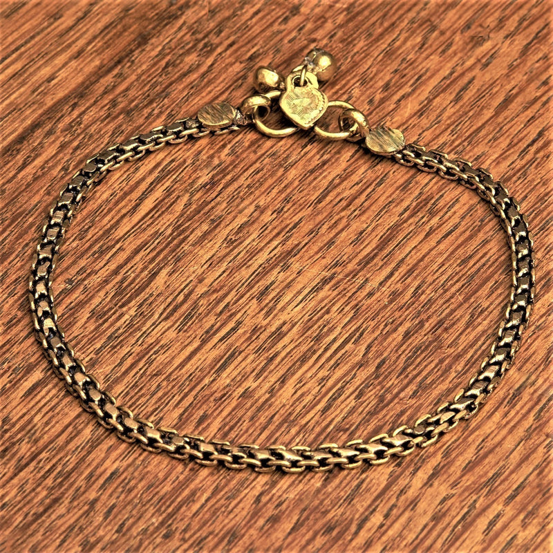 An artisan handmade, chunky, pure brass boxed chain anklet designed by OMishka.
