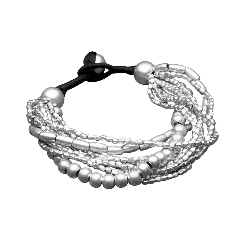 Artisan handmade chunky silver, mixed cube, round and barrel beaded bracelet designed by OMishka.