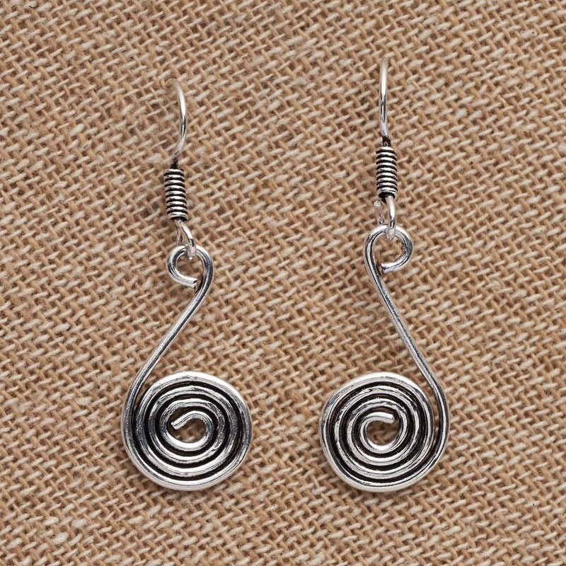 Artisan handmade solid silver, dainty single silver spiral, drop hook earrings designed by OMishka.