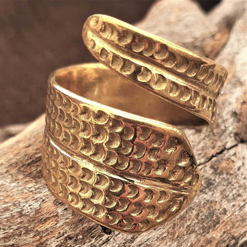 An adjustable, artisan handmade pure brass, chunky dotted wrap ring designed by OMishka.