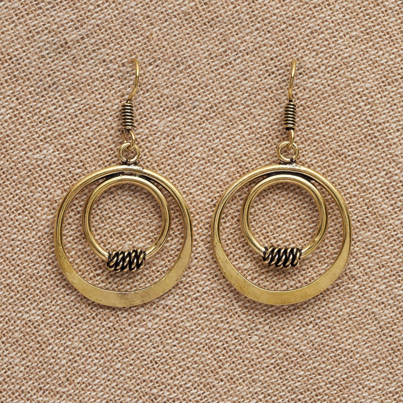 Artisan handmade pure brass, double nested circle, drop hook earrings designed by OMishka.