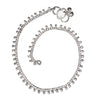 An artisan handmade, simple, solid silver fine beaded anklet with tiny bells designed by OMishka.
