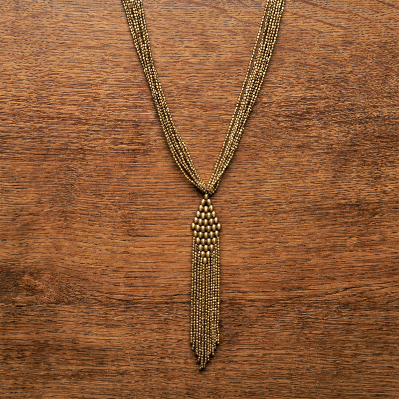 Artisan handmade pure brass, golden beaded diamond shaped, long drop multi strand necklace designed by OMishka.