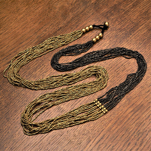 Artisan handmade, striped golden and black brass, long beaded multi strand necklace designed by OMishka.