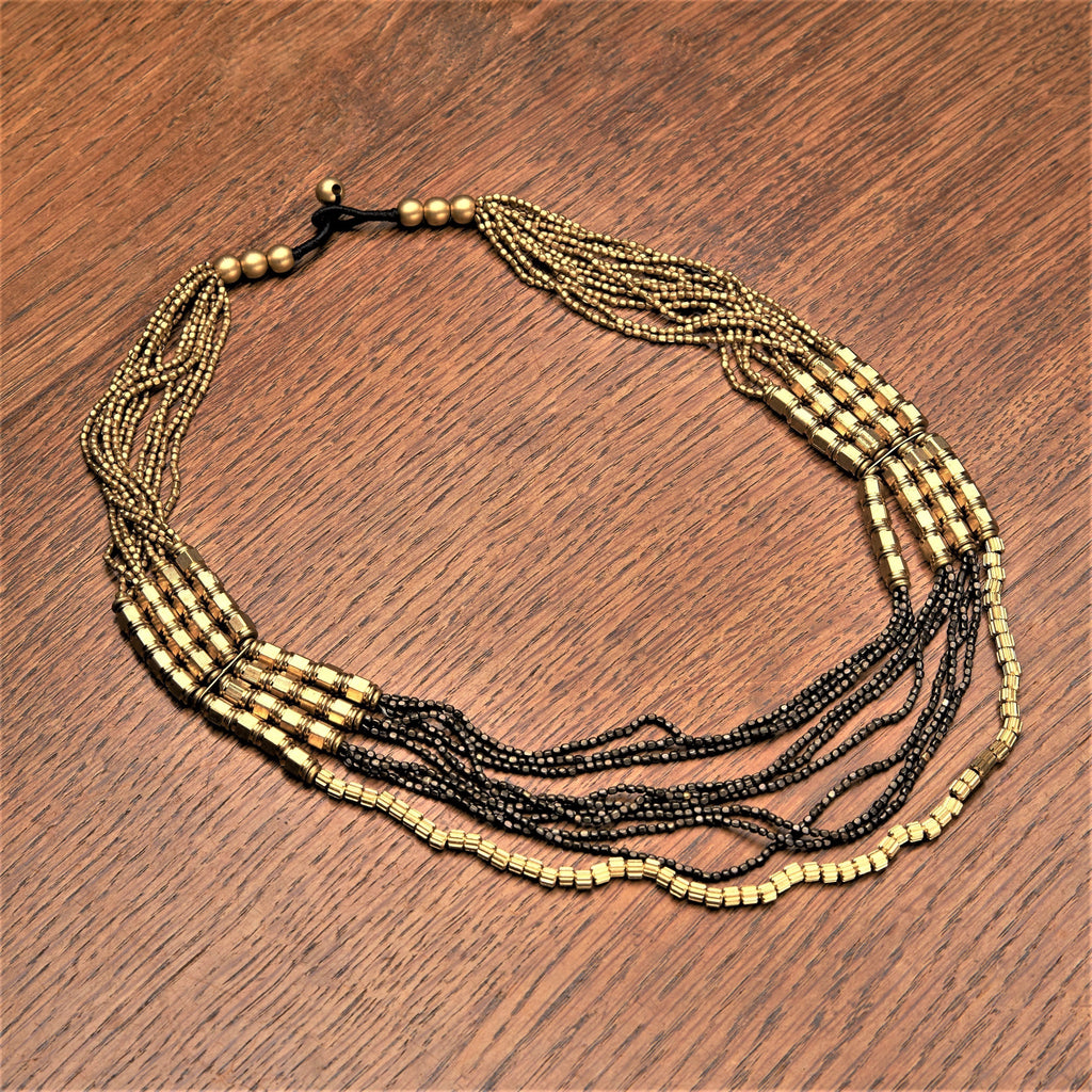 Handmade, layered golden and oxidised black brass, beaded multi strand necklace designed by OMishka.