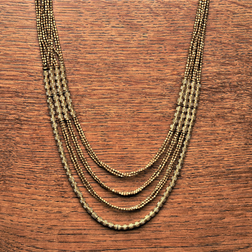 Artisan handmade, golden brass etched beaded, layered multi strand necklace designed by OMishka.