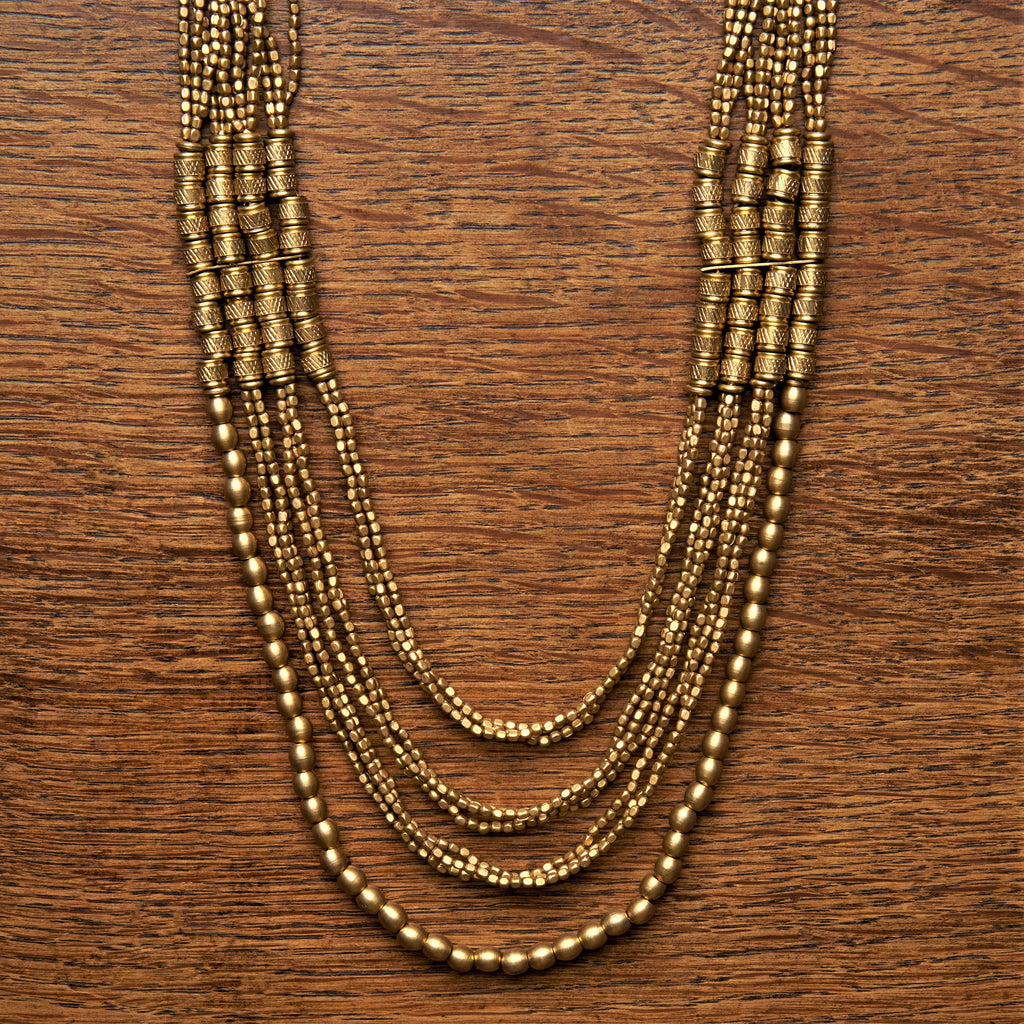 Artisan handmade, layered, pure brass beaded multi strand necklace designed by OMishka.