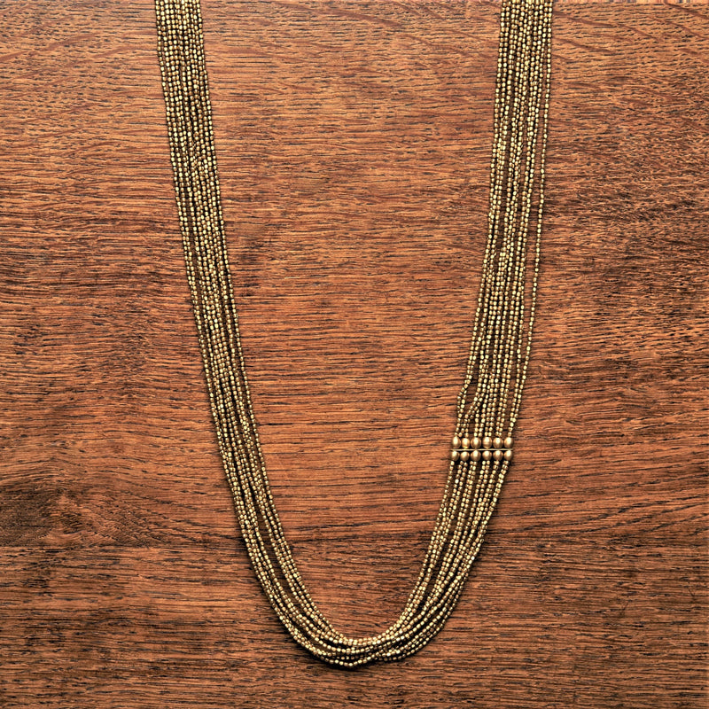 Artisan handmade pure brass, tiny cube and smooth barrel beaded, long multi strand necklace designed by OMishka.