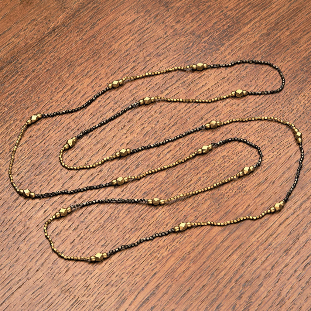 Artisan handmade, striped pure golden and black brass beaded, long single strand necklace designed by OMishka.