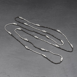 Artisan handmade, striped silver toned and black brass, beaded, long single strand necklace designed by OMishka.