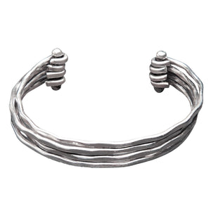 An elegant artisan handmade, multi strand hammered silver cuff bracelet designed by OMishka.