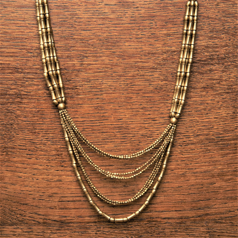 Artisan handmade pure brass, tiny cube and bone beaded, long layered multi strand necklace designed by OMishka.
