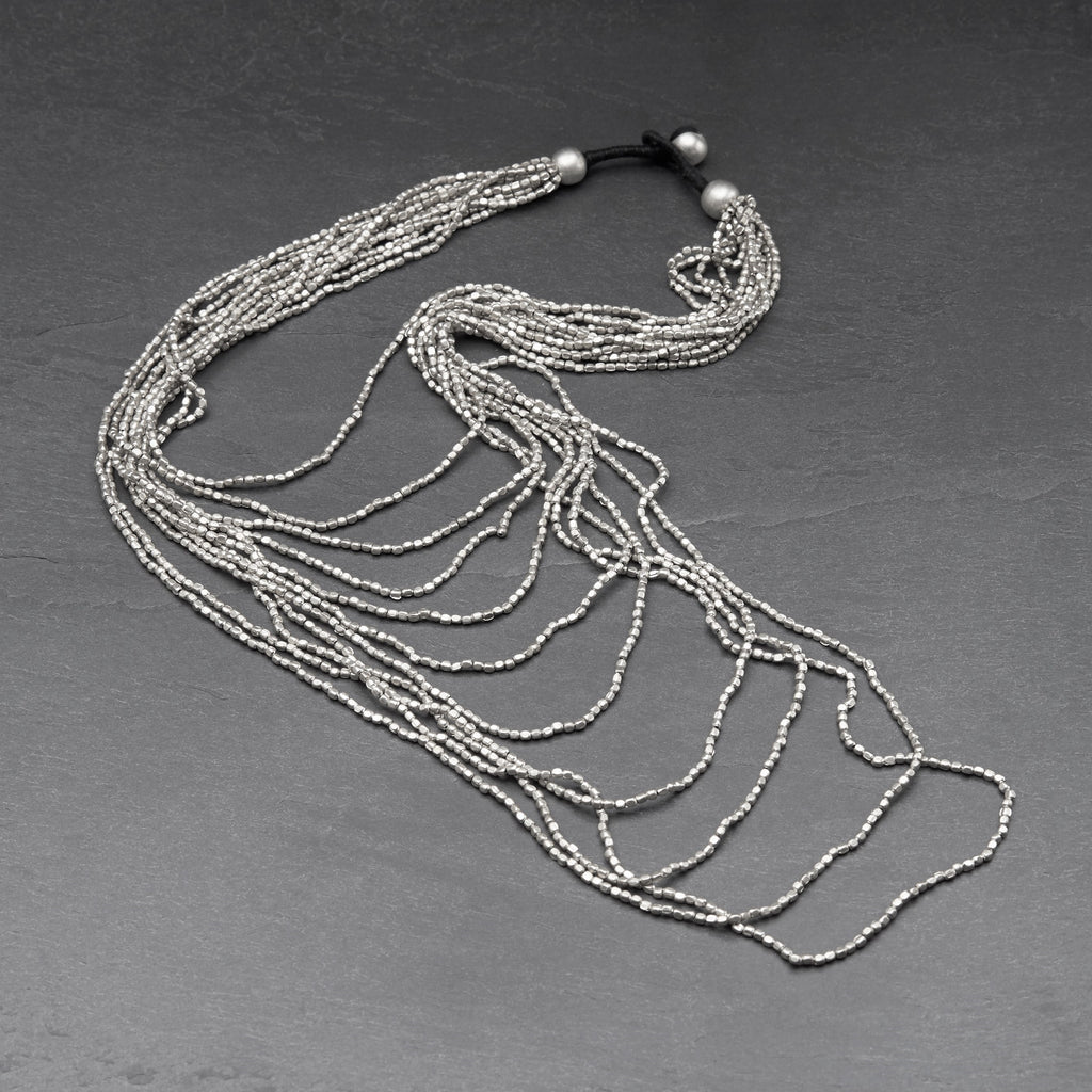 Artisan handmade, silver, tiny cube beaded, long, layered multi strand necklace designed by OMishka.