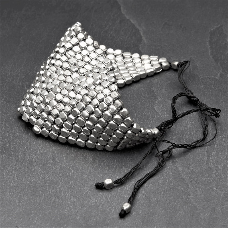 Artisan handmade silver cube beaded, Naga tribe wide woven adjustable drawstring bracelet designed by OMishka.