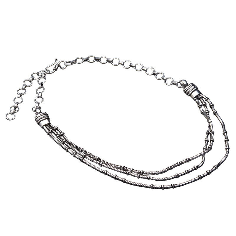 Artisan handmade silver toned white metal, three strand, subtle beaded, adjustable snake chain necklace designed by OMishka.