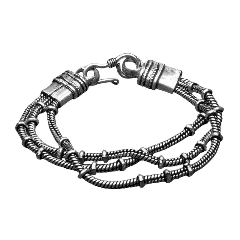 Artisan handmade silver toned plated brass, triple strand, subtle beaded snake chain bracelet designed by OMishka.