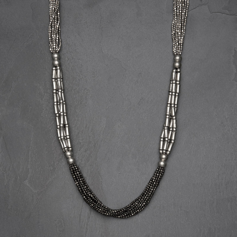 Artisan handmade, silver toned and oxidised black brass, tiny cube and bone beaded multi strand necklace designed by OMishka.