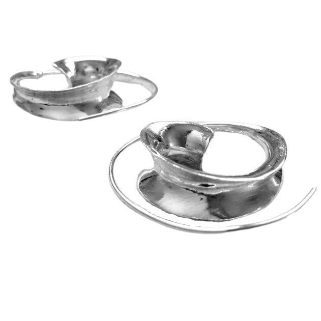 Artisan handmade solid silver, concave shaped spiral wave hoop earrings designed by OMishka.