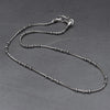 Artisan handmade silver, disc beaded snake chain necklace designed by OMishka.