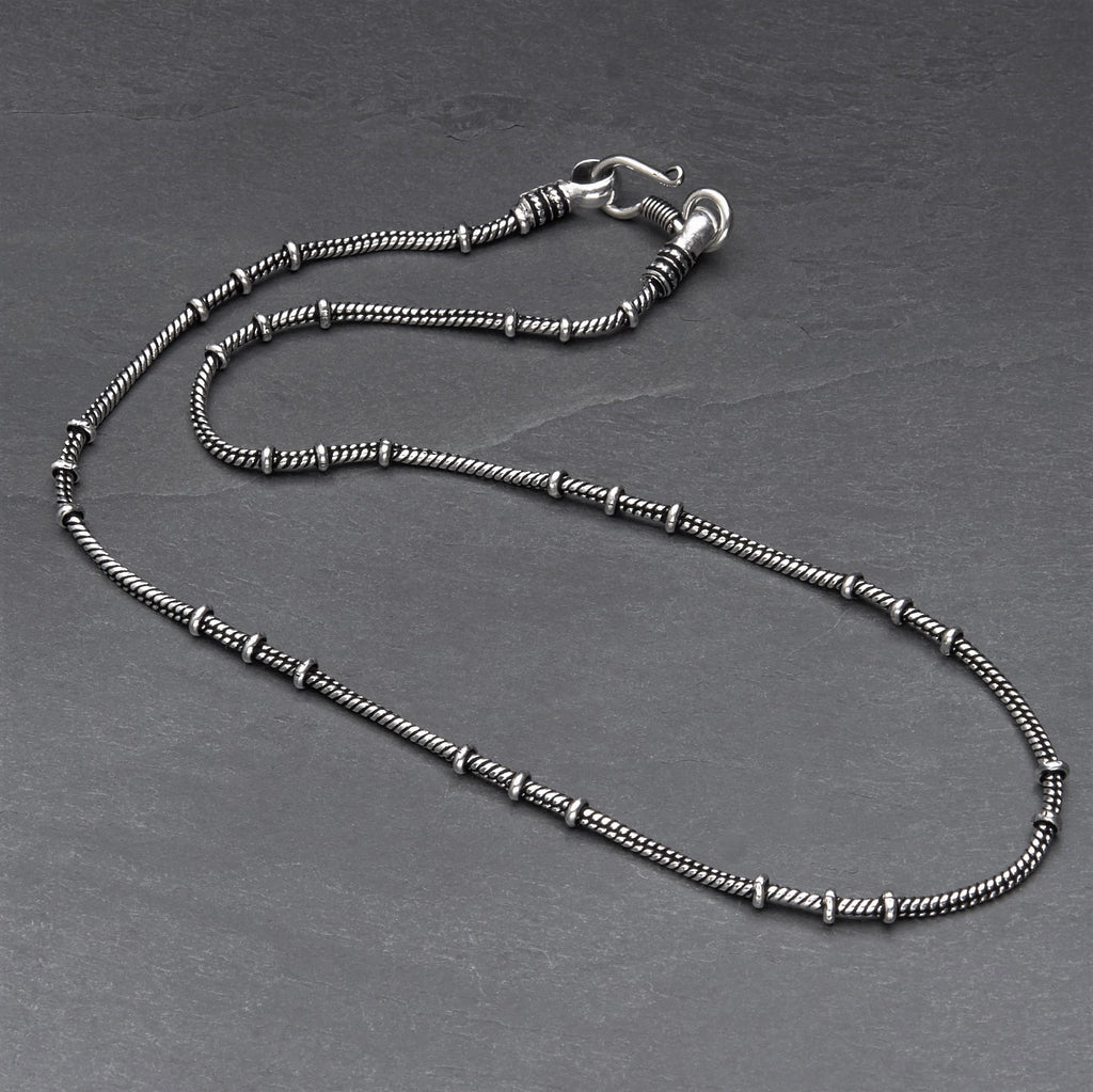 Artisan handmade silver, disc beaded snake chain necklace designed by OMishka.