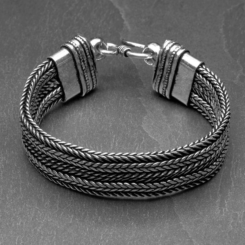 Artisan handmade silver toned brass, chunky double braided foxtail chain bracelet designed by OMishka.
