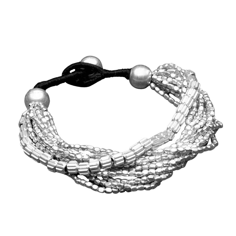 Artisan handmade silver, etched barrel beaded multi strand bracelet designed by OMishka.