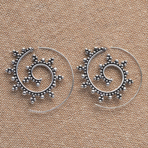 Artisan handmade solid silver, large, decorative dotted spiral hoop earrings designed by OMishka.
