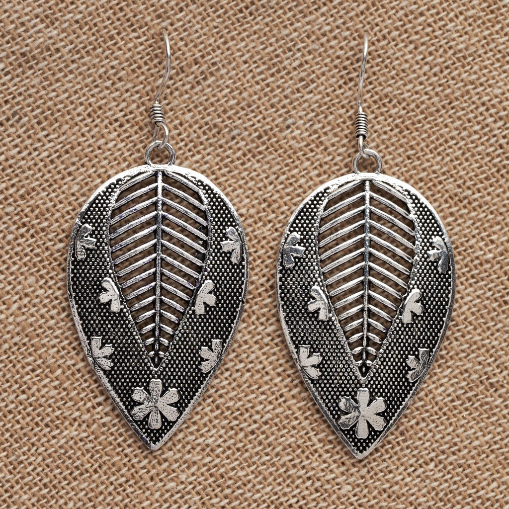 Artisan handmade solid silver, flower and dot patterned, large leaf drop earrings designed by OMishka.