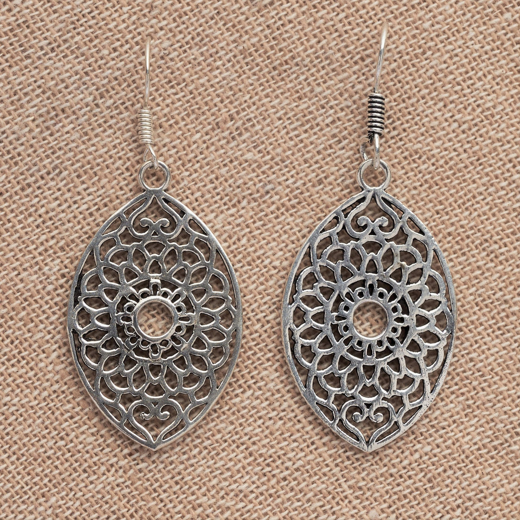 Artisan handmade solid silver, large oval shaped, floral patterned dangle earrings designed by OMishka.