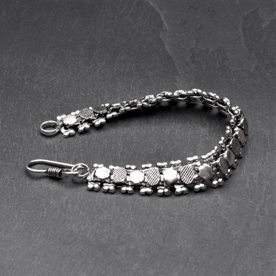 Artisan handmade oxidised silver toned, patterned disc and beaded, chain link bracelet designed by OMishka.