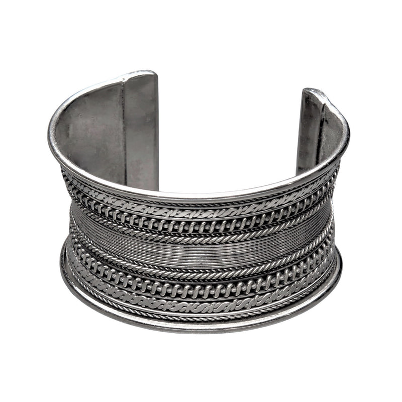 An artisan handmade, silver patterned cuff bracelet designed by OMishka.