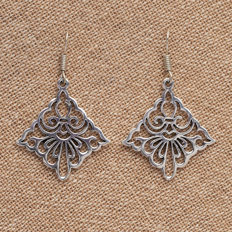 Artisan handmade solid silver, rhombus shaped, filigree floral cut out dangle earrings designed by OMishka.