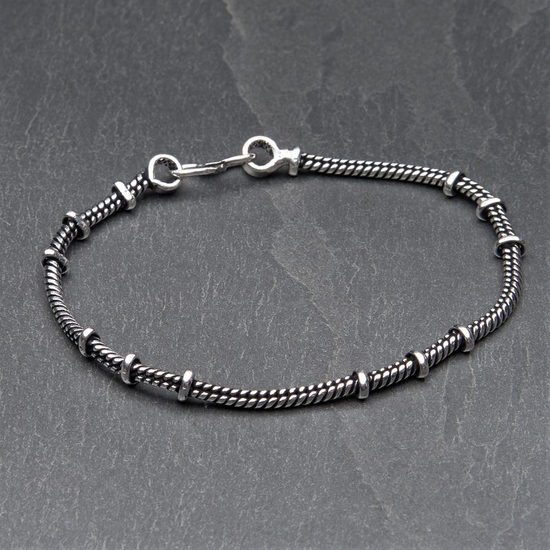 Artisan handmade silver toned plated brass, subtle beaded thin snake chain bracelet designed by OMishka.