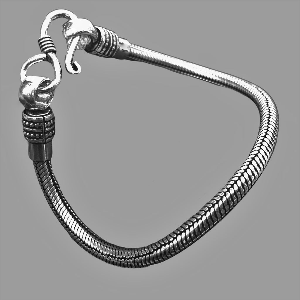Artisan handmade silver toned brass, simple and slim snake chain bracelet designed by OMishka.